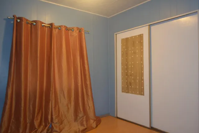 a bathroom with a sink a mirror and vanity
