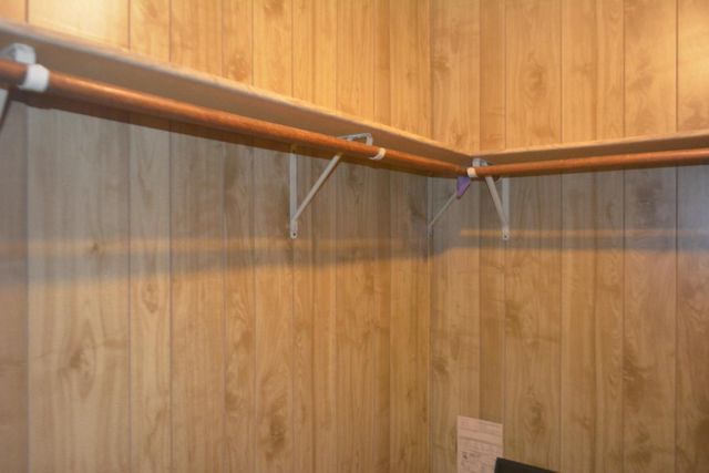 a bathroom with a glass shower door