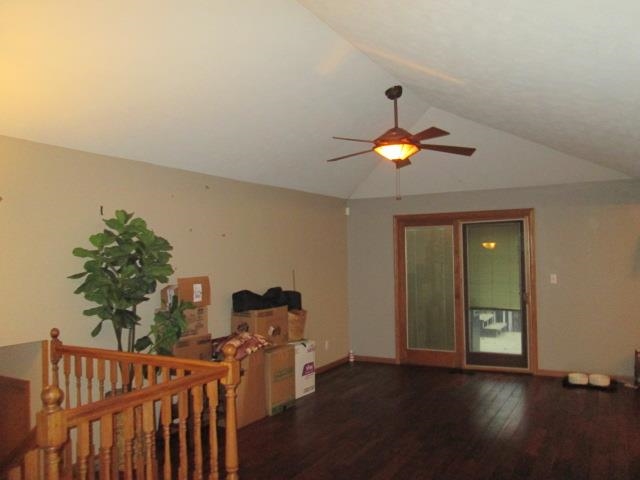 5747 Gray Eagle Road Roscoe, IL 61073 - Photo 6 of 39 a living room with furniture and a chandelier