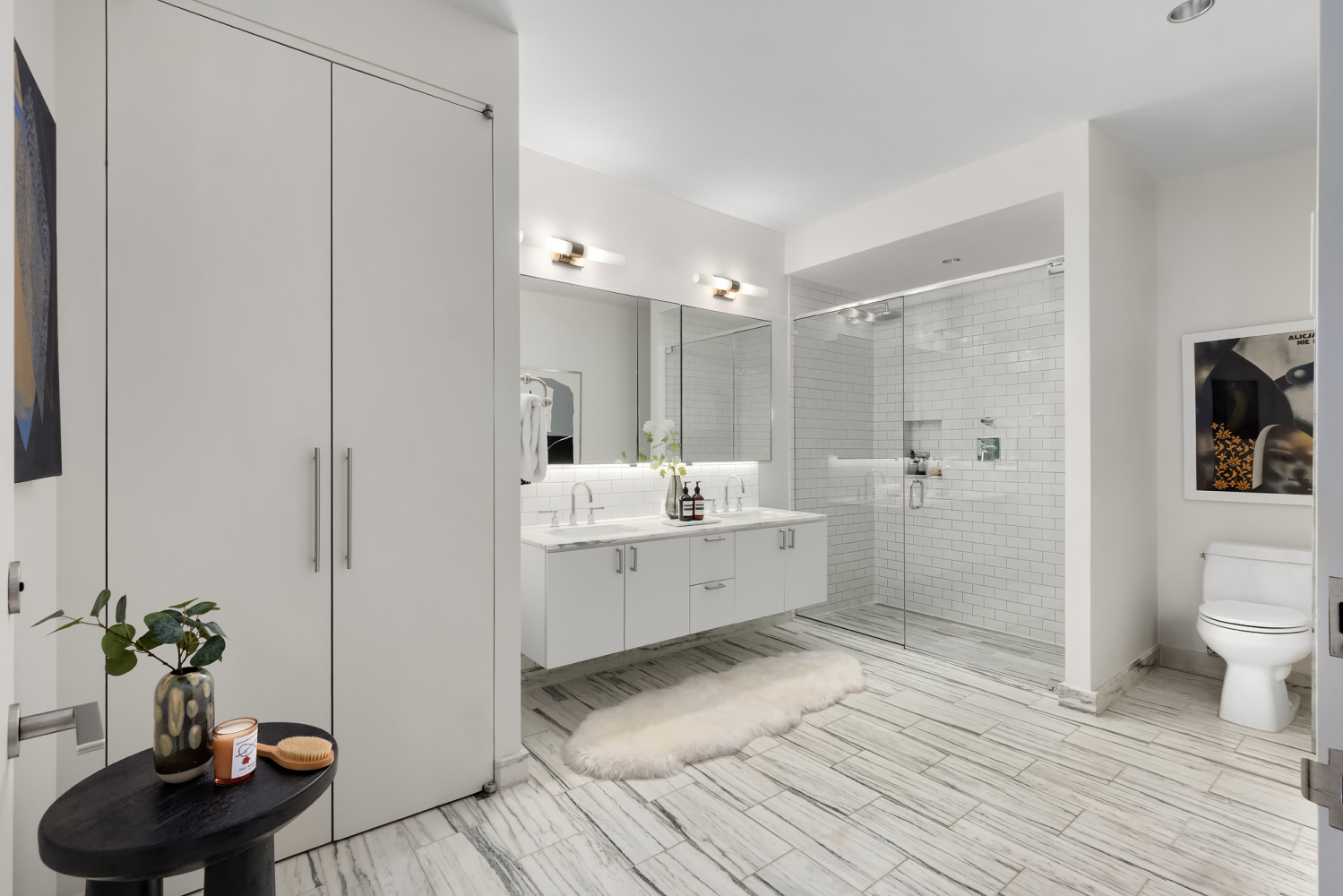 63 Greene Street, Unit PHA Manhattan, NY 10012 - Photo 12 of 20 a bathroom with a sink toilet and shower