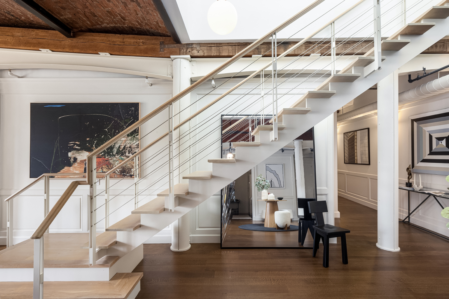 63 Greene Street, Unit PHA Manhattan, NY 10012 - Photo 7 of 20 a view of entryway and hall with wooden floor