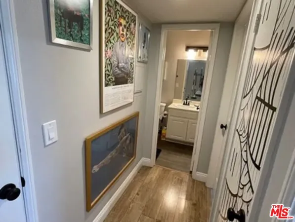 a bedroom with bed and window