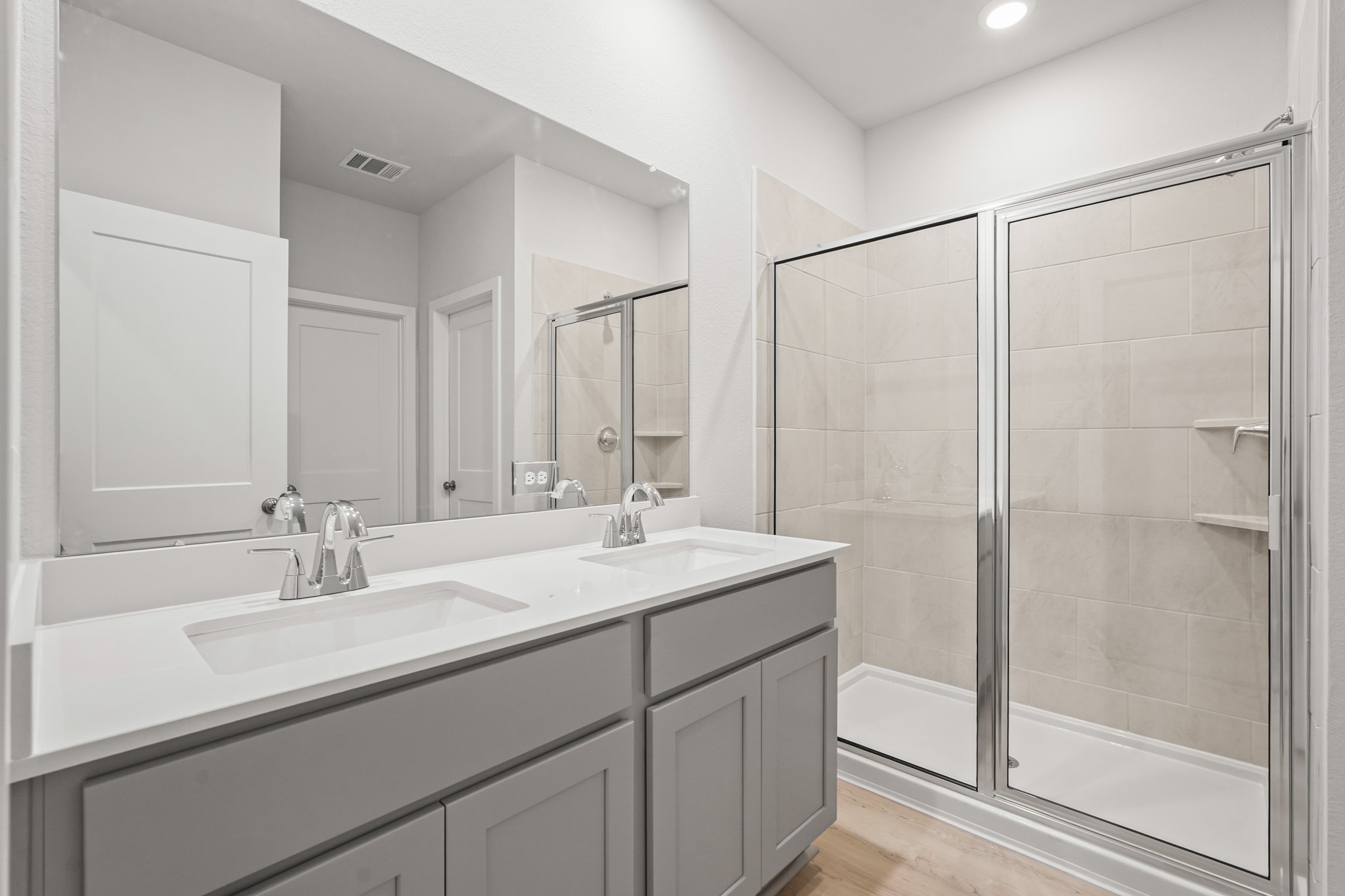 217 Spring Drive Hockley, TX 77447 - Photo 11 of 27 a bathroom with a sink and a mirror