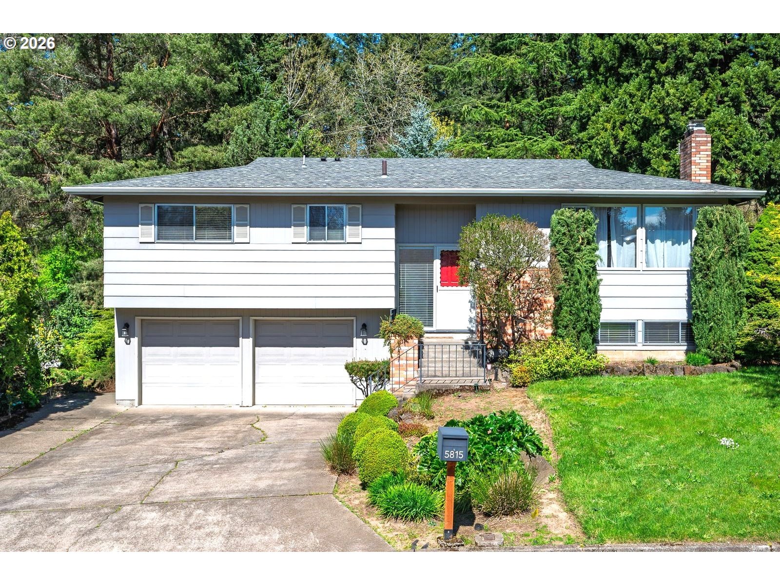 5815 Southwest Huddleson Street Portland, OR 97219 - Photo 1 of 35 a house view with a outdoor space