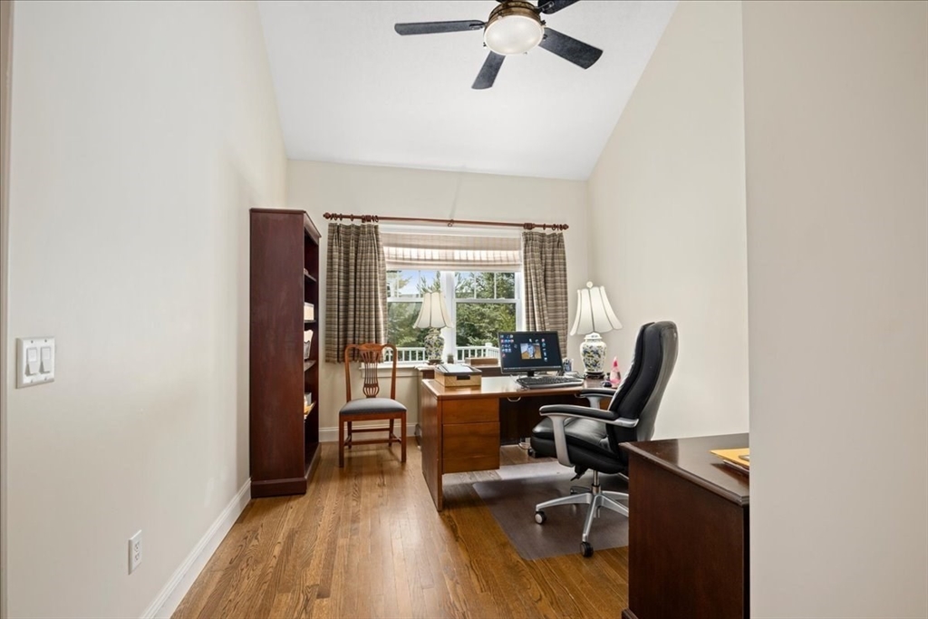 7 Primmett Lane, Unit 7 Worcester, MA 01609 - Photo 18 of 38 a view of a workspace with furniture and a window