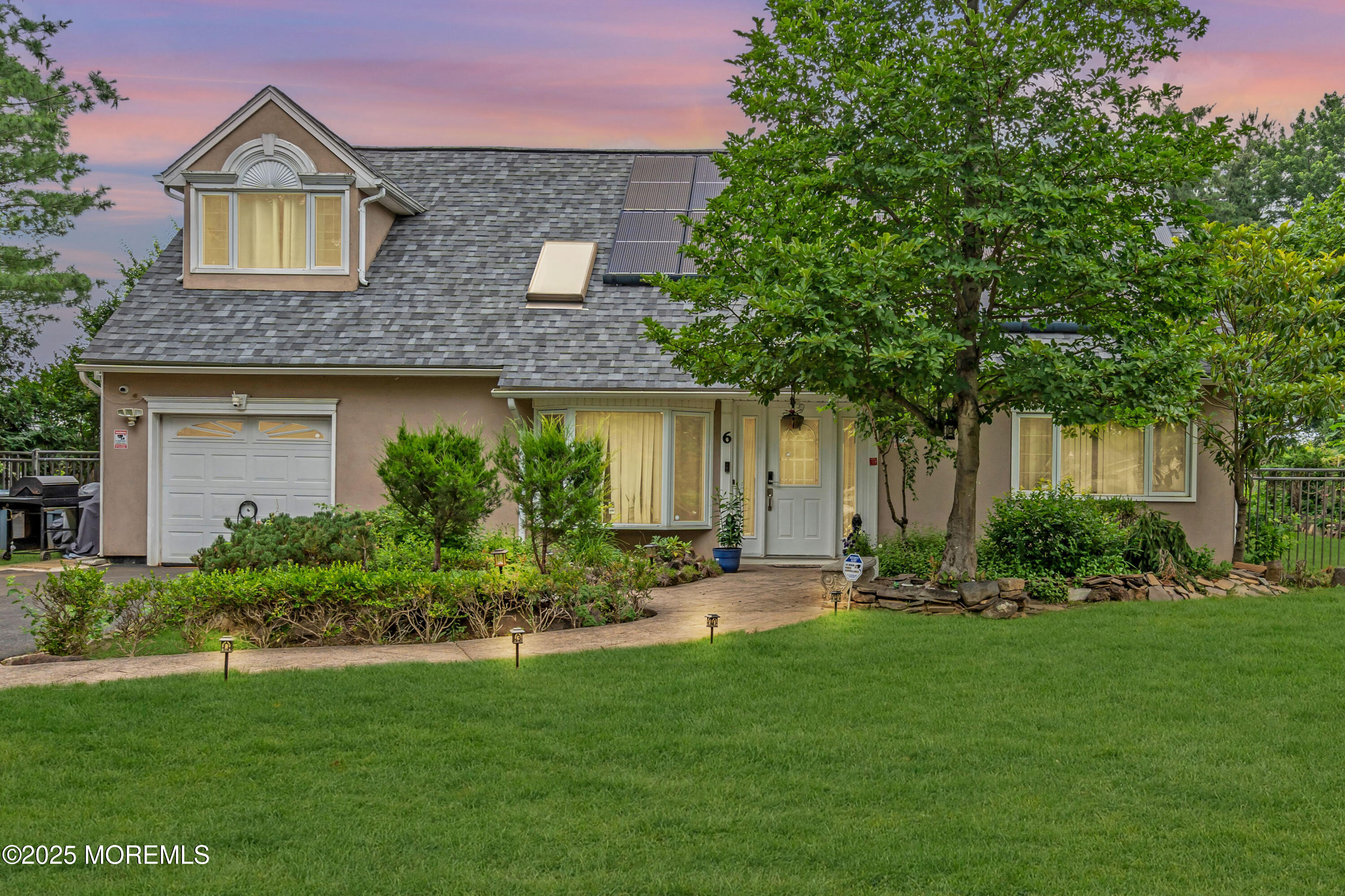 6 Hillcrest Road Manalapan, NJ 07726 - Photo 1 of 25 a front view of a house with a yard