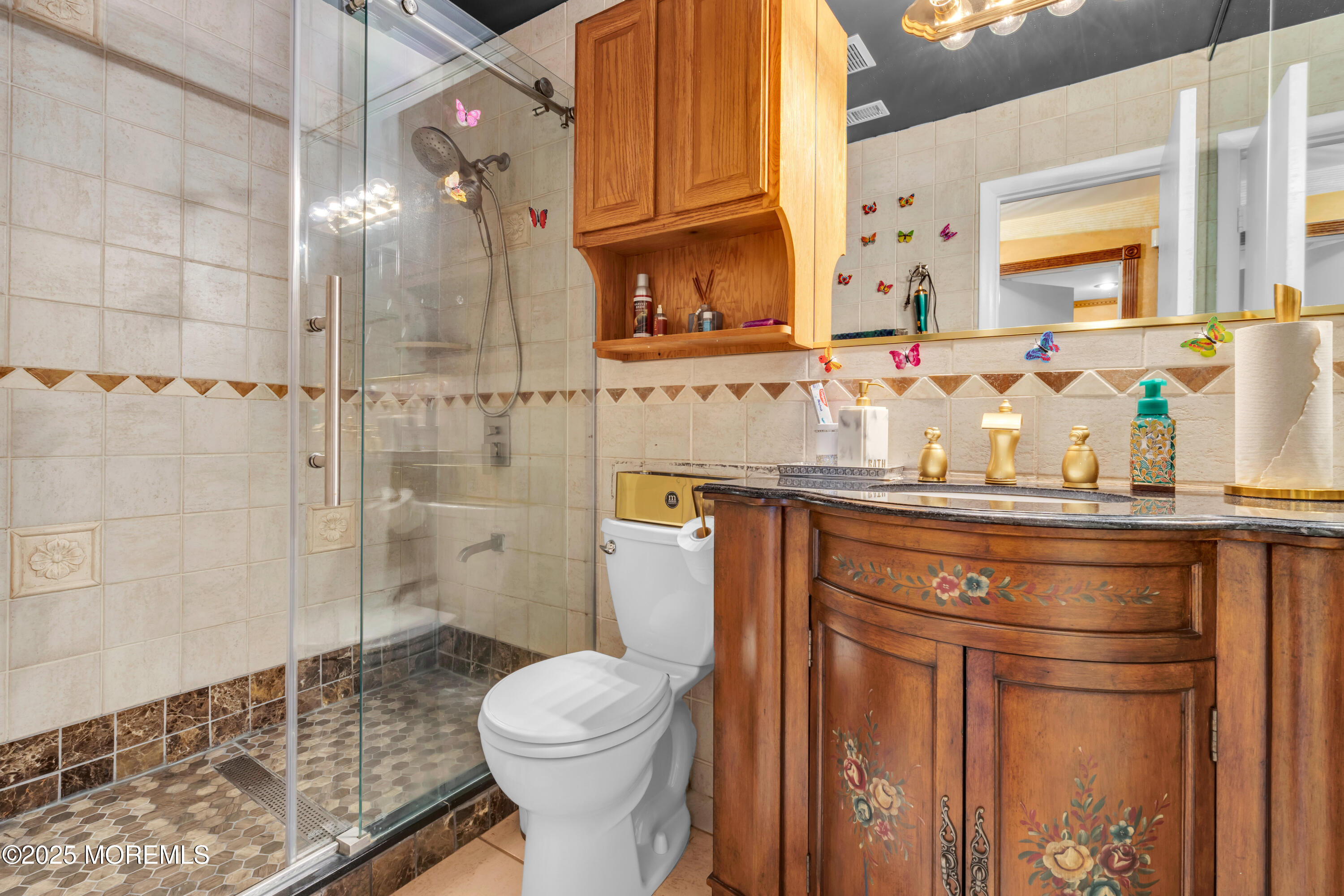 6 Hillcrest Road Manalapan, NJ 07726 - Photo 11 of 25 a bathroom with a sink toilet and shower