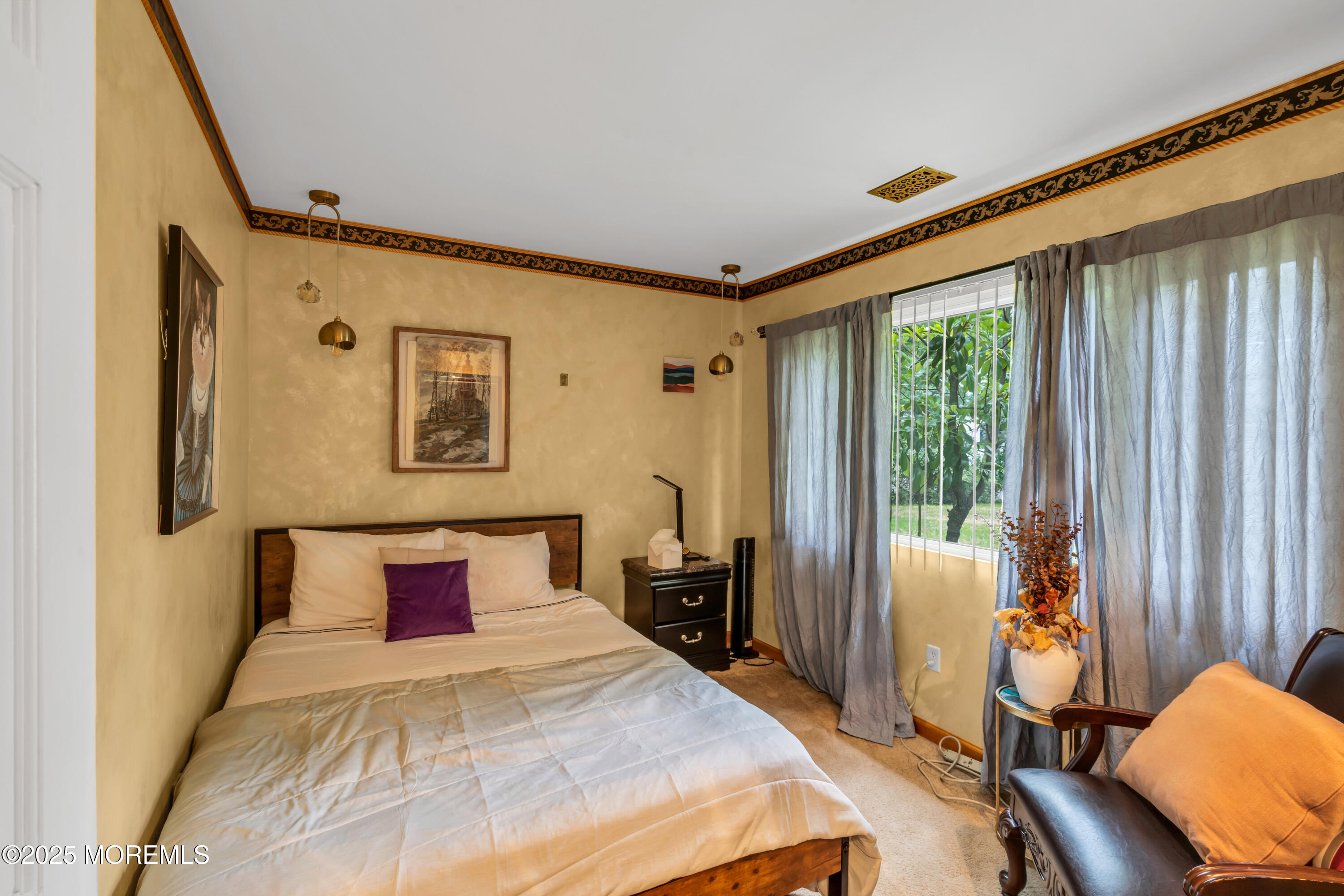 6 Hillcrest Road Manalapan, NJ 07726 - Photo 12 of 25 a bedroom with bed and wooden floor