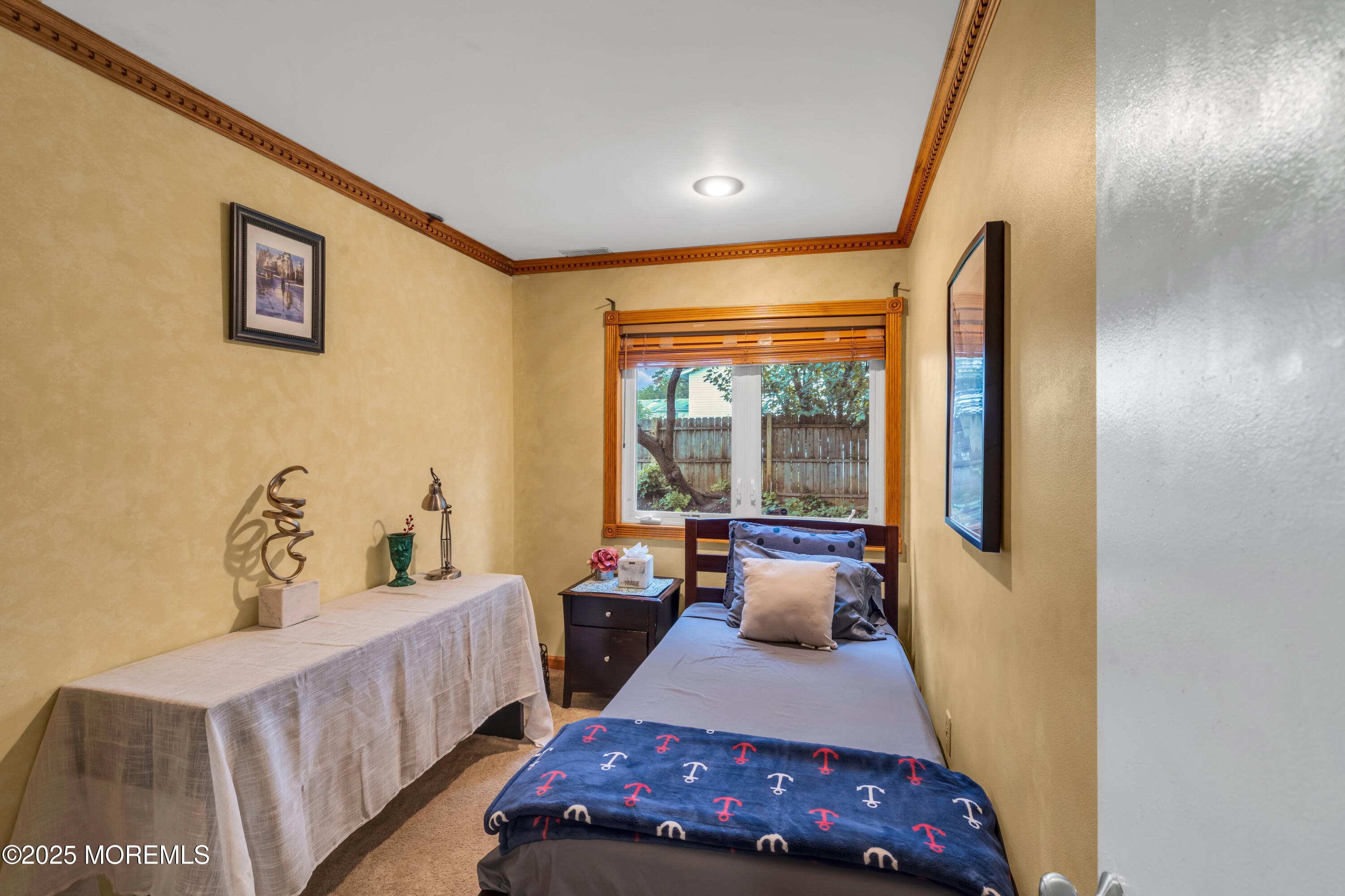 6 Hillcrest Road Manalapan, NJ 07726 - Photo 13 of 25 a bedroom with furniture and a window