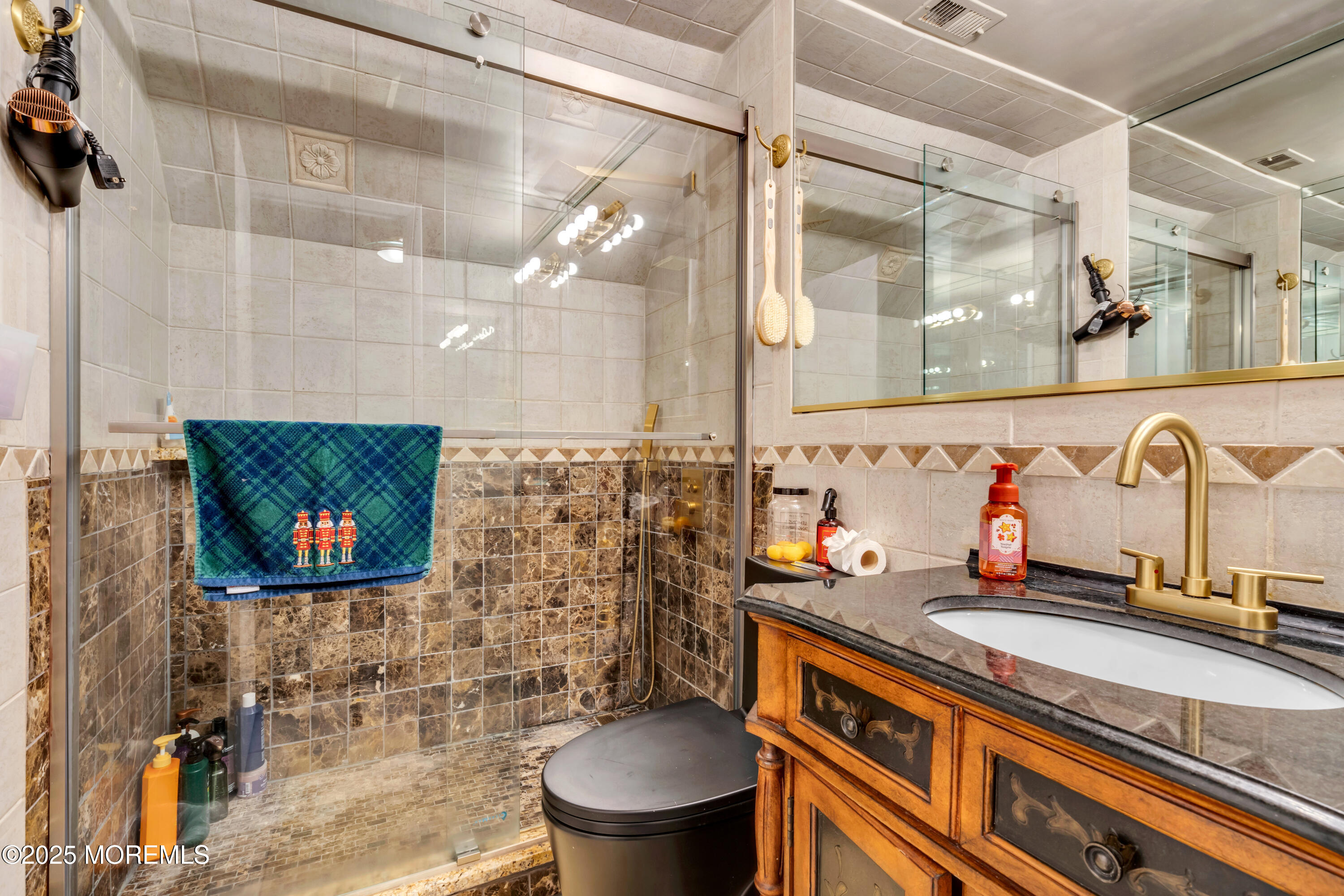 6 Hillcrest Road Manalapan, NJ 07726 - Photo 14 of 25 a bathroom with a granite countertop sink and a mirror
