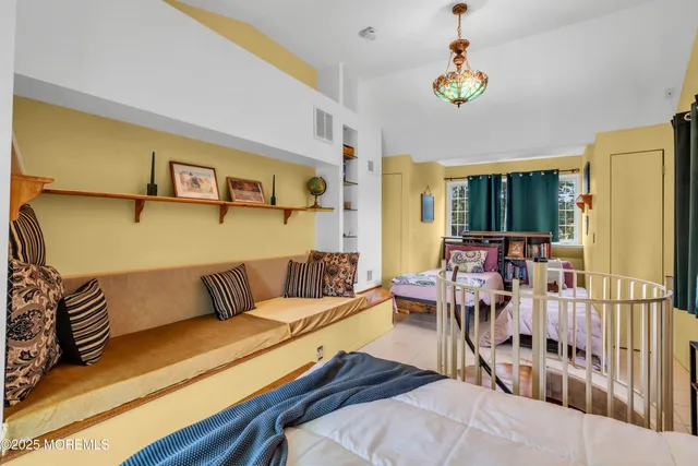 a view of a living room and entryway