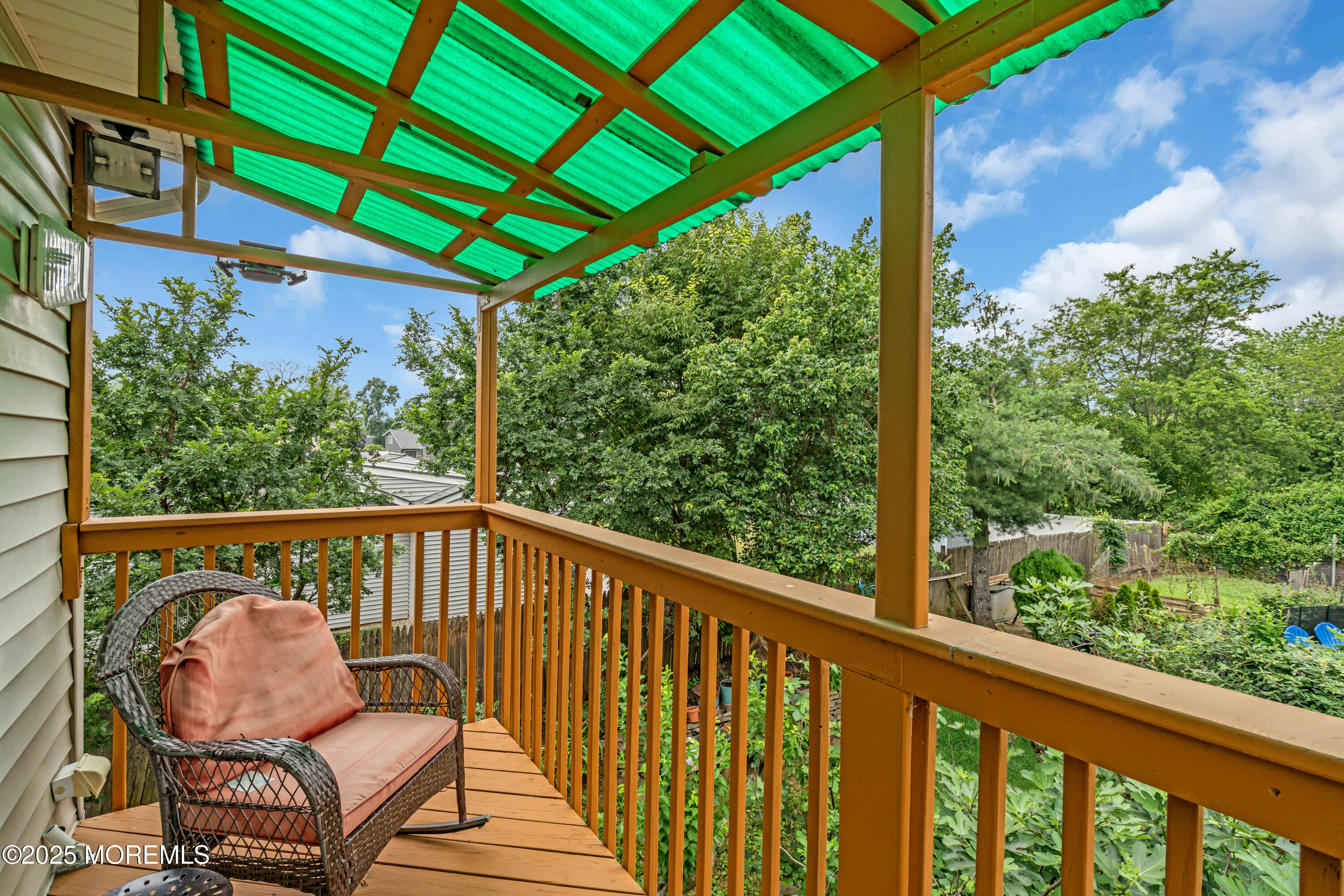 6 Hillcrest Road Manalapan, NJ 07726 - Photo 19 of 25 a view of a two chair in the balcony