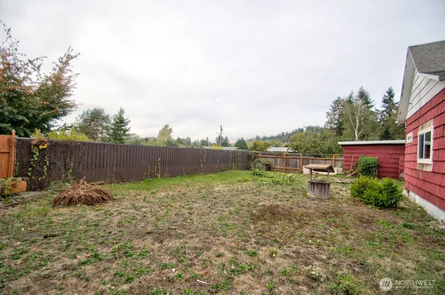 a view of backyard with green space