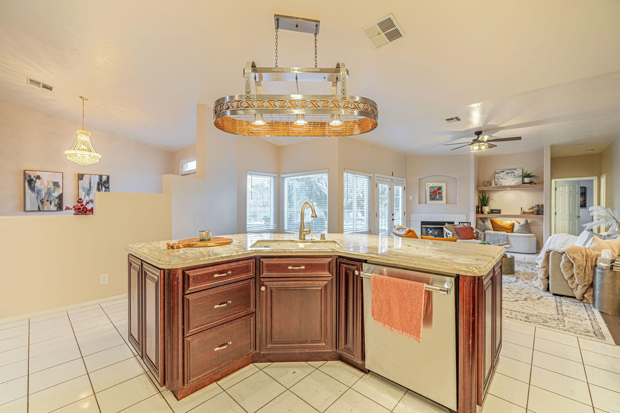 41002 Flagstone Street Palmdale, CA 93551 - Photo 12 of 57 a kitchen with stainless steel appliances granite countertop a sink and cabinets