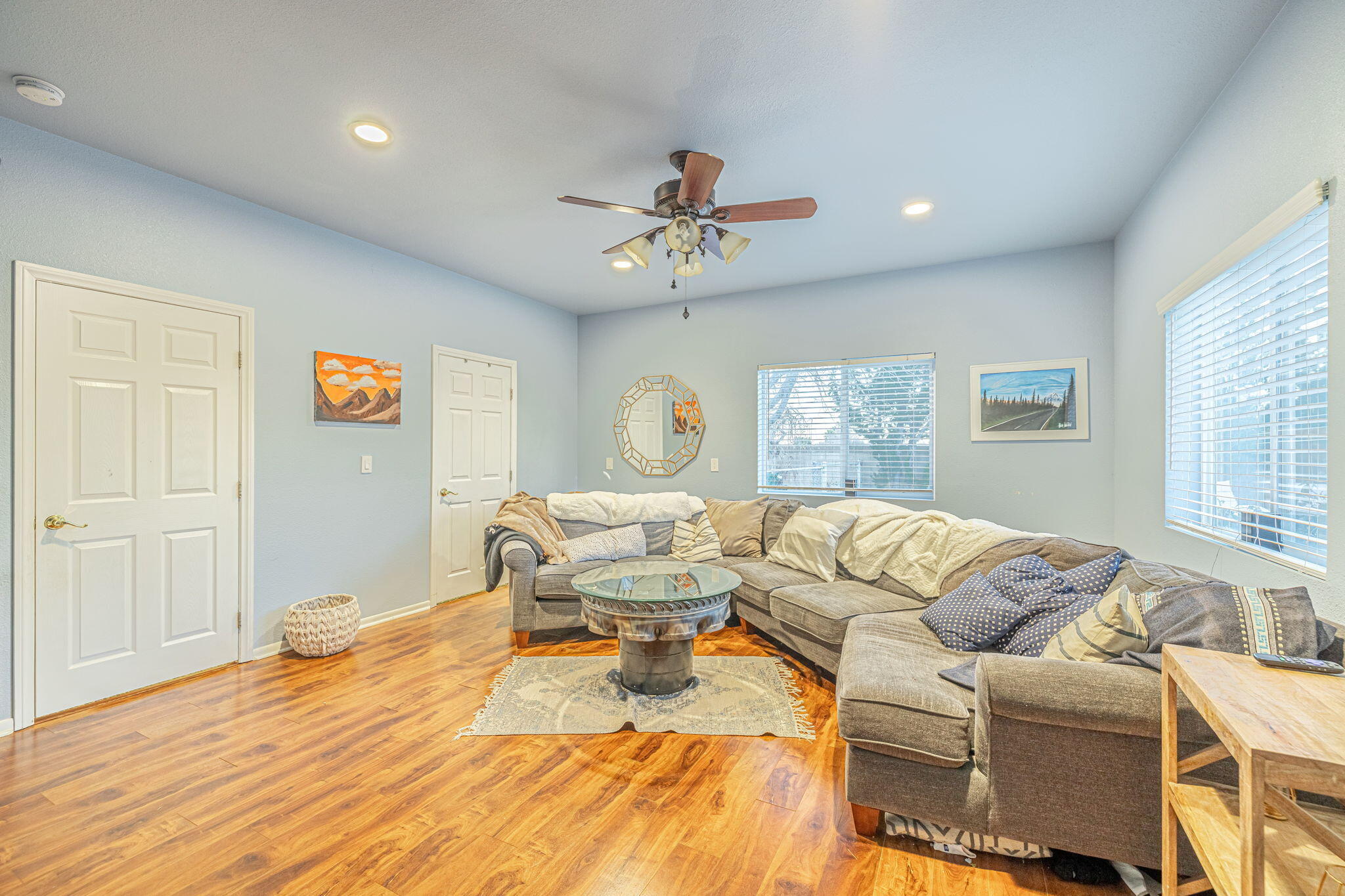 41002 Flagstone Street Palmdale, CA 93551 - Photo 25 of 57 a living room with furniture and a window