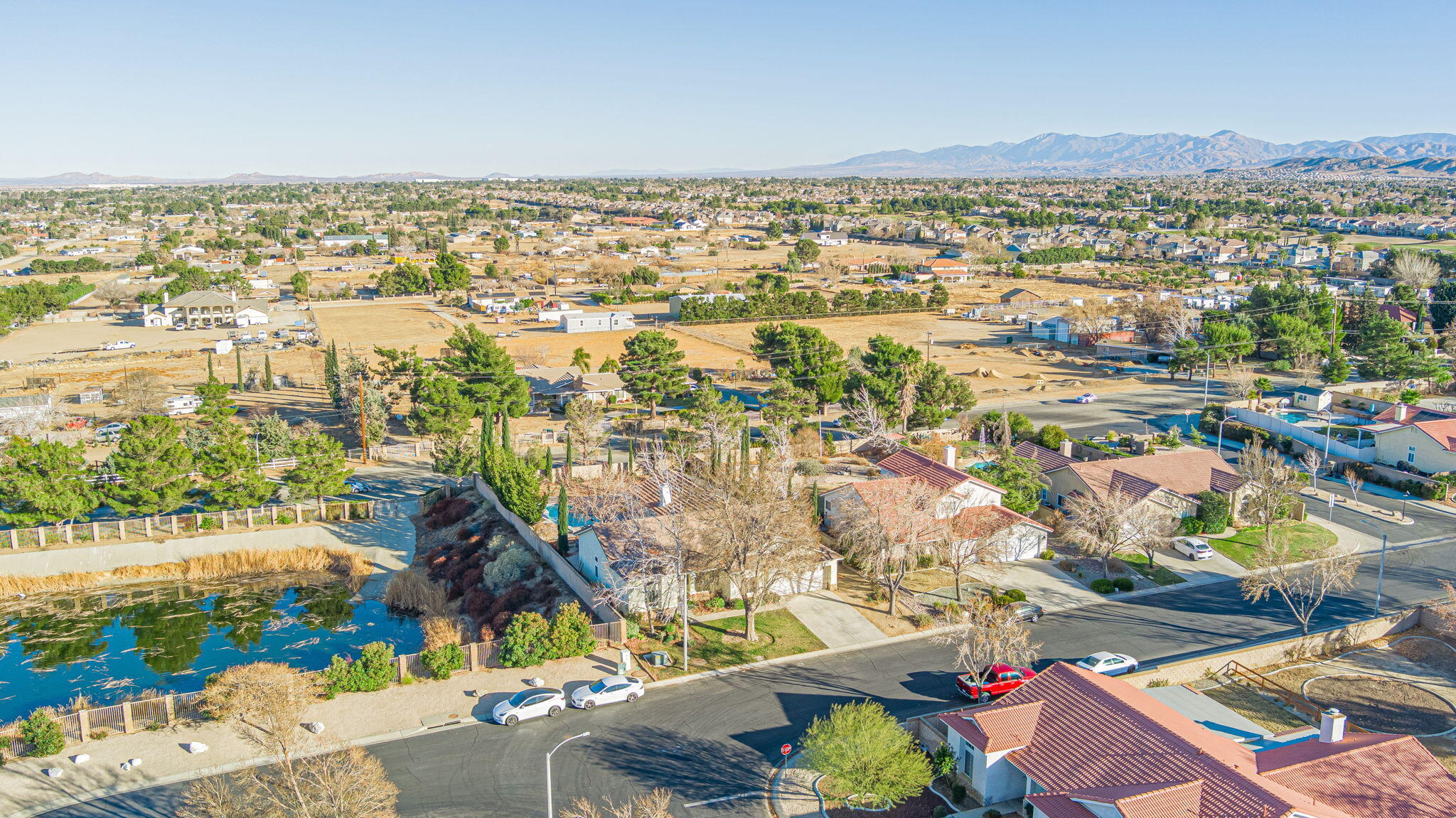 41002 Flagstone Street Palmdale, CA 93551 - Photo 36 of 57 an aerial view of residential houses with outdoor space
