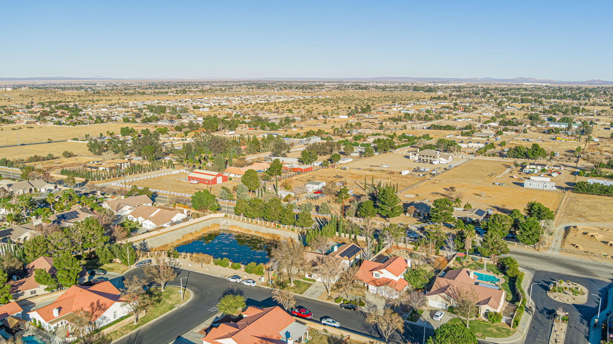 41002 Flagstone Street Palmdale, CA 93551 - Photo 38 of 57 an aerial view of residential building and ocean