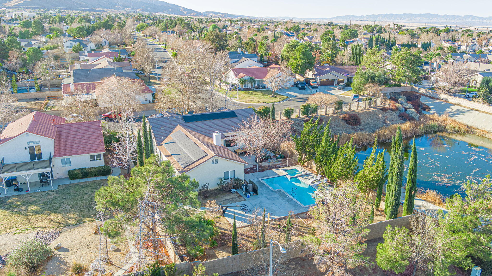 41002 Flagstone Street Palmdale, CA 93551 - Photo 40 of 57 an aerial view of multiple house