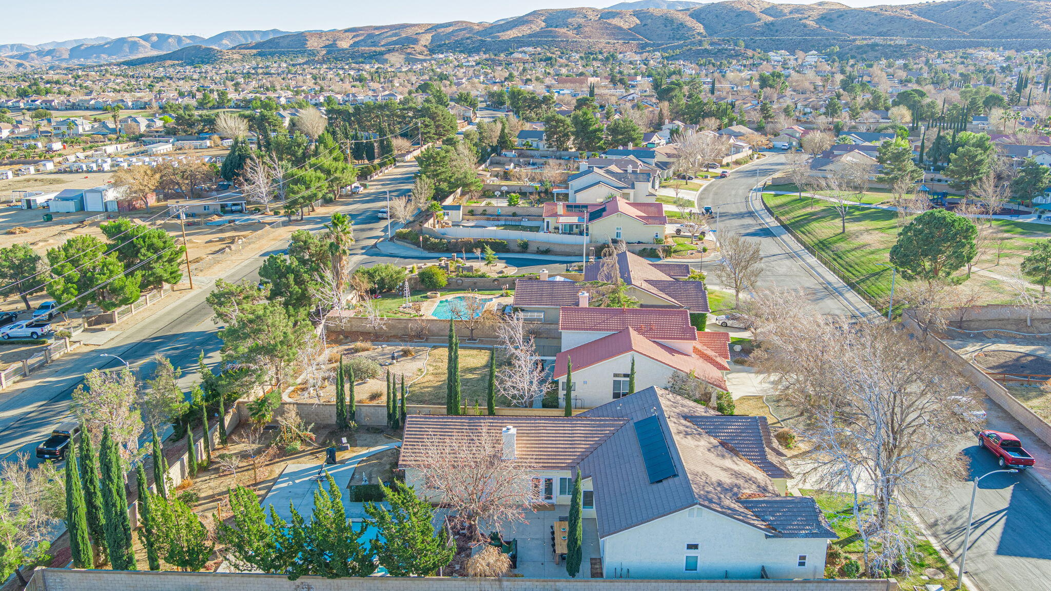 41002 Flagstone Street Palmdale, CA 93551 - Photo 49 of 57 an aerial view of residential houses with outdoor space
