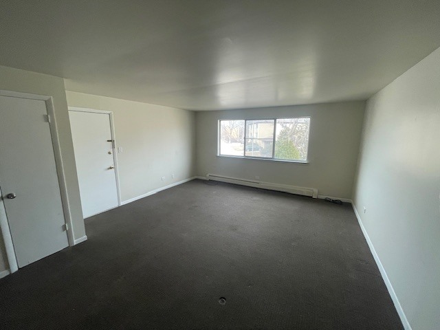3901 West 124th Street, Unit 2E Alsip, IL 60803 - Photo 4 of 13 an empty room with windows