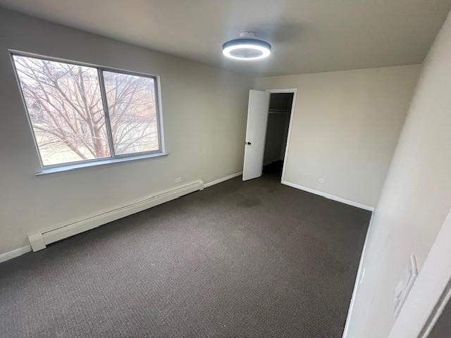 3901 West 124th Street, Unit 2E Alsip, IL 60803 - Photo 9 of 13 an empty room with windows