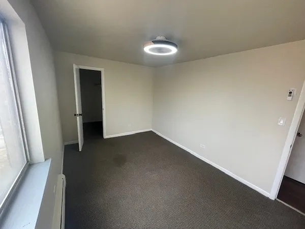 a view of a room with windows