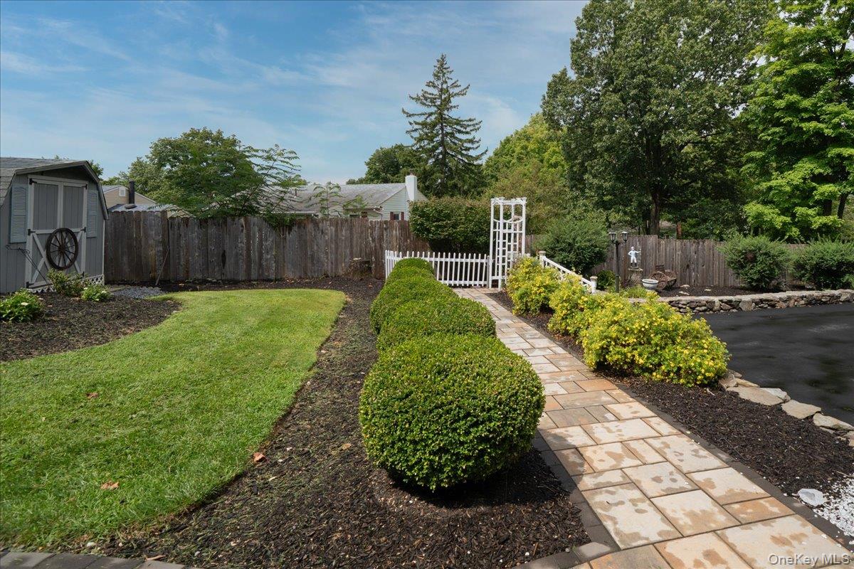 Pavers pathways to entrance and back yard