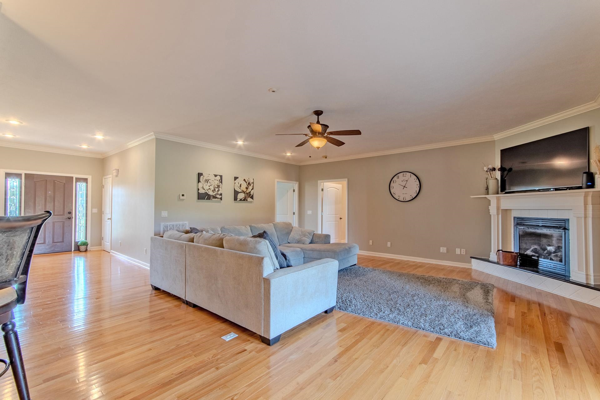 2705 Oak Grove Road Savannah, TN 38372 - Photo 13 of 40 a living room with furniture and a flat screen tv