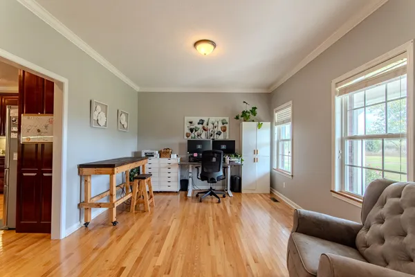 a view of livingroom with furniture and wooden floor