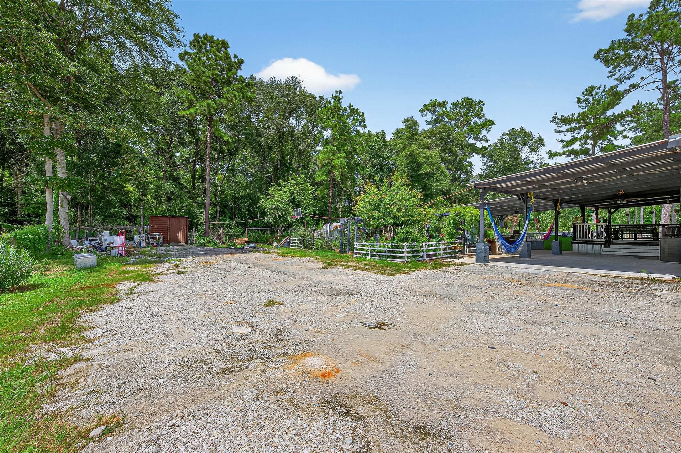 12514 County Road 3740 Cleveland, TX 77327 - Photo 20 of 31 a view of a park with plants and trees