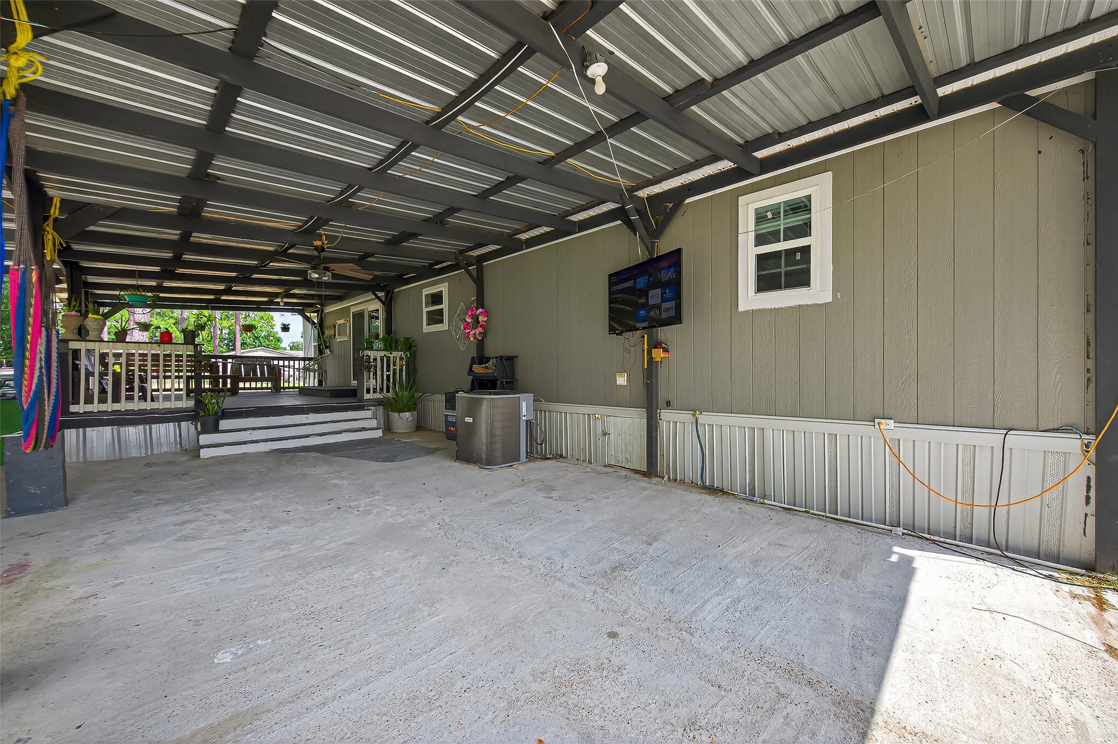12514 County Road 3740 Cleveland, TX 77327 - Photo 27 of 31 a view of empty room with wooden ceiling