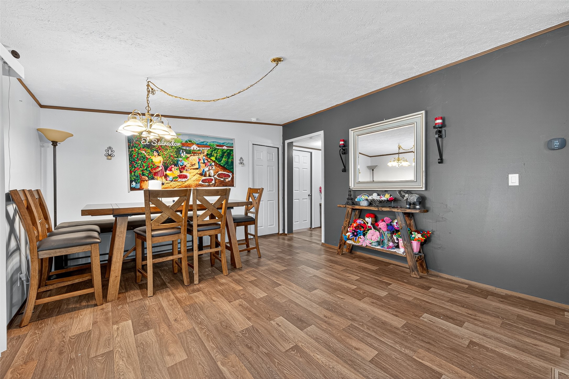 12514 County Road 3740 Cleveland, TX 77327 - Photo 7 of 31 a view of a room with furniture and wooden floor