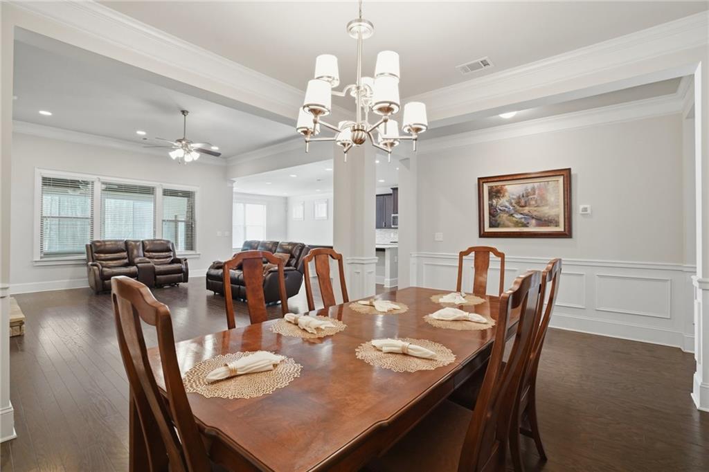 1810 Geranium Lane Cumming, GA 30040 - Photo 15 of 37 a view of a dining room with furniture