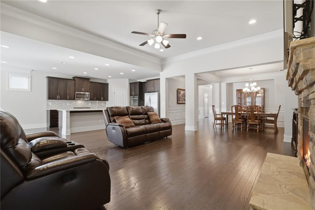 1810 Geranium Lane Cumming, GA 30040 - Photo 16 of 37 a living room with furniture and kitchen view