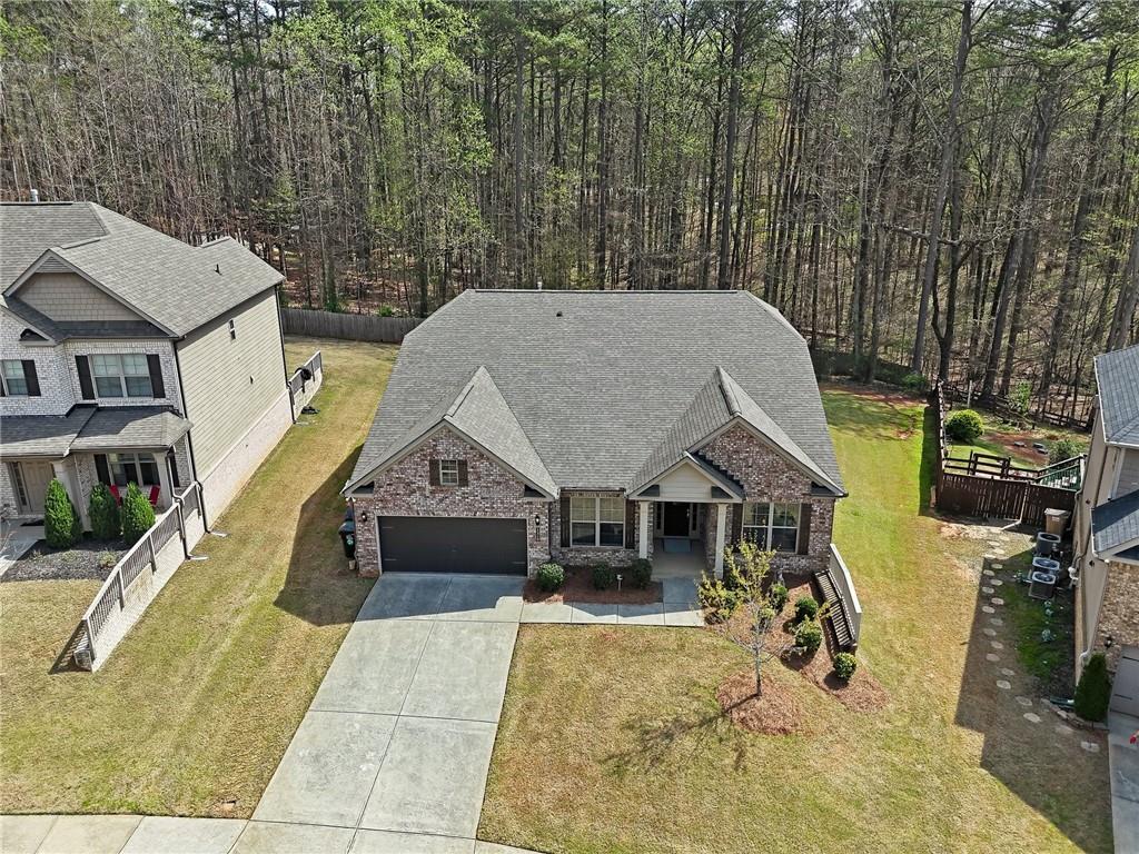 1810 Geranium Lane Cumming, GA 30040 - Photo 32 of 37 a view of a house with backyard