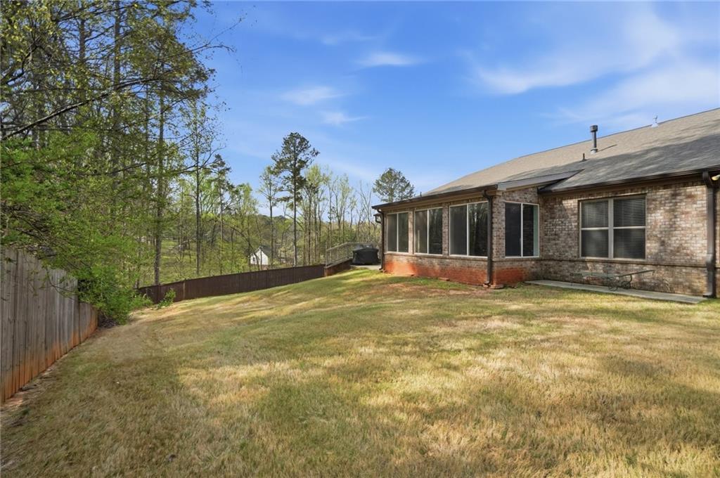 1810 Geranium Lane Cumming, GA 30040 - Photo 36 of 37 a view of a house with backyard and porch