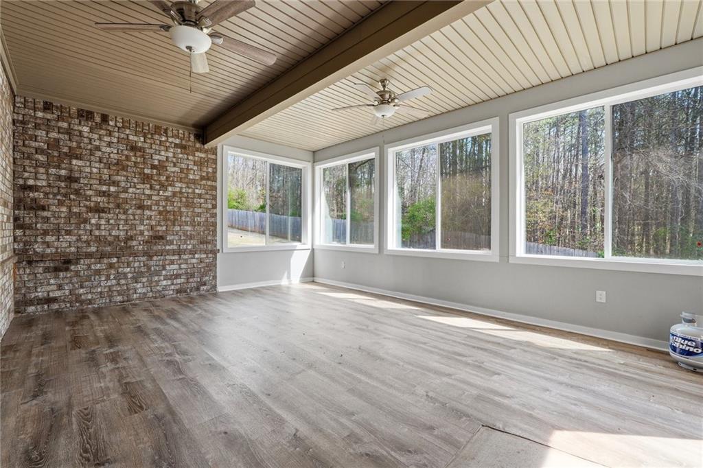 1810 Geranium Lane Cumming, GA 30040 - Photo 5 of 37 a view of an empty room with a window