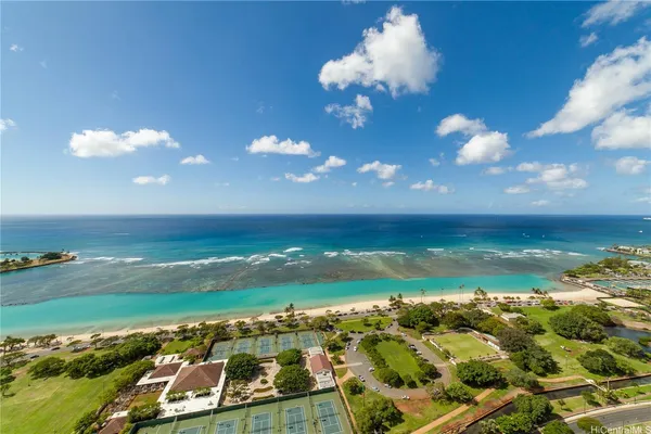 a view of an ocean and a building