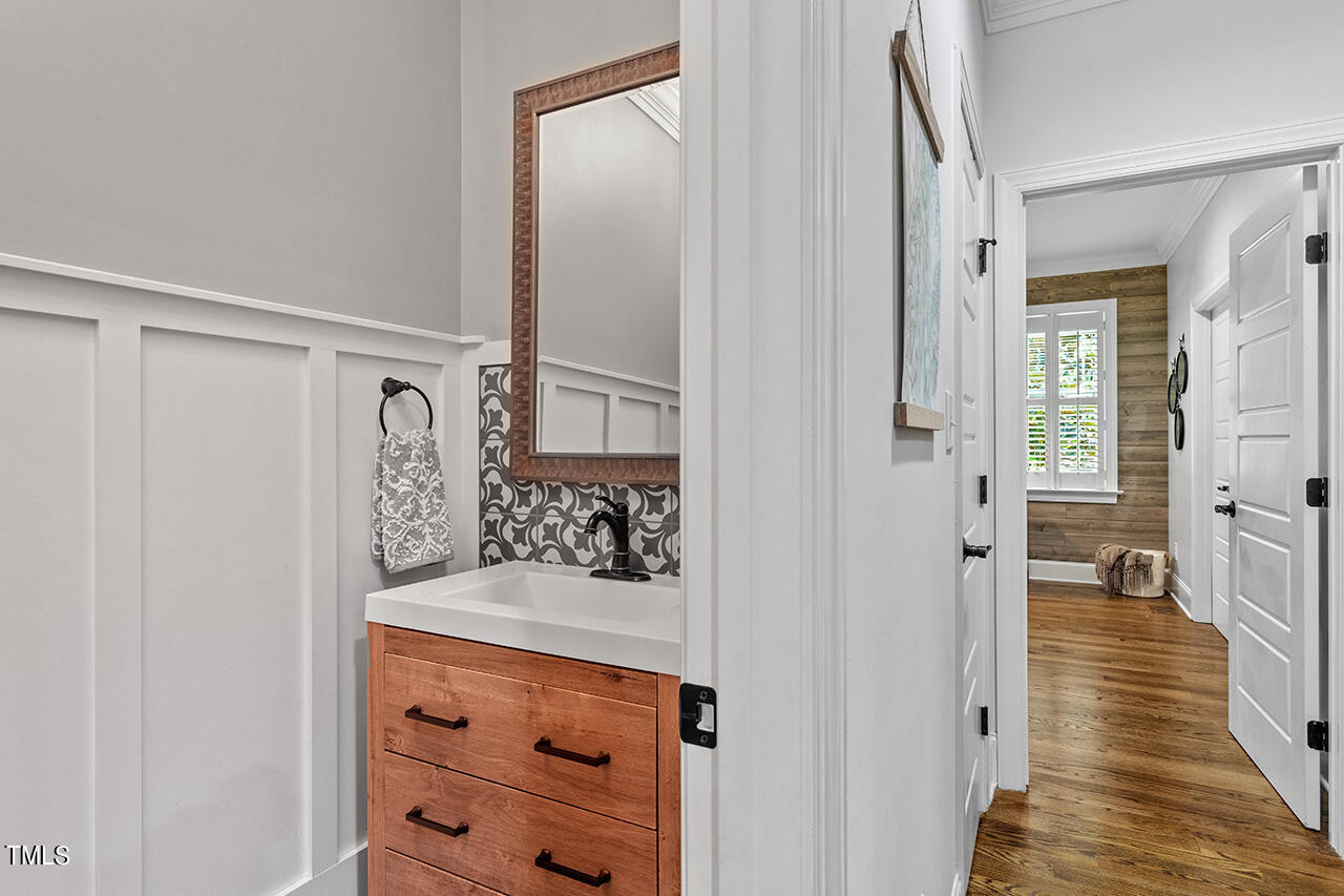 2016 Brassfield Road Raleigh, NC 27614 - Photo 14 of 44 a bedroom with a bed and a dresser