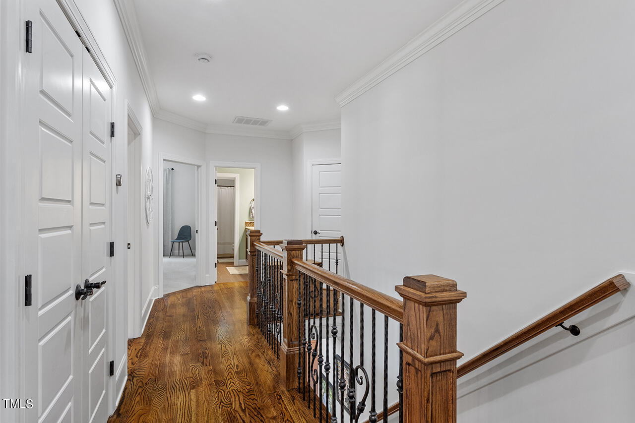 2016 Brassfield Road Raleigh, NC 27614 - Photo 22 of 44 a view of a hallway with closet
