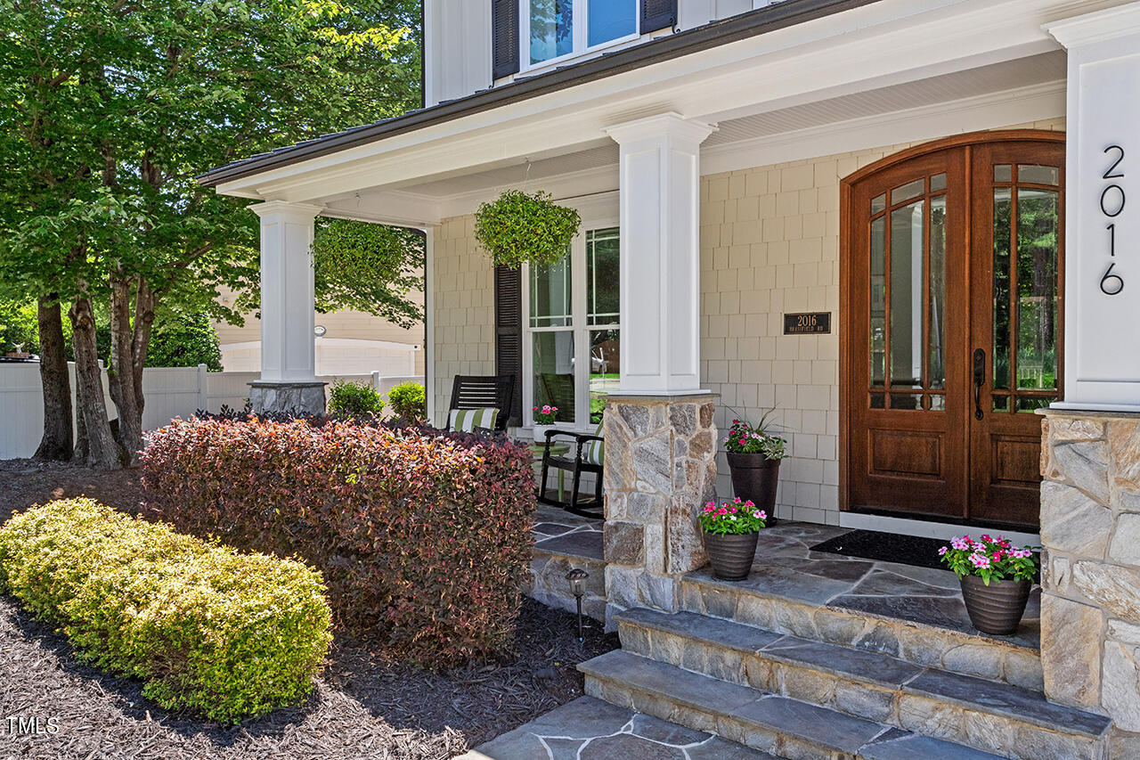 2016 Brassfield Road Raleigh, NC 27614 - Photo 3 of 44 a front view of a house