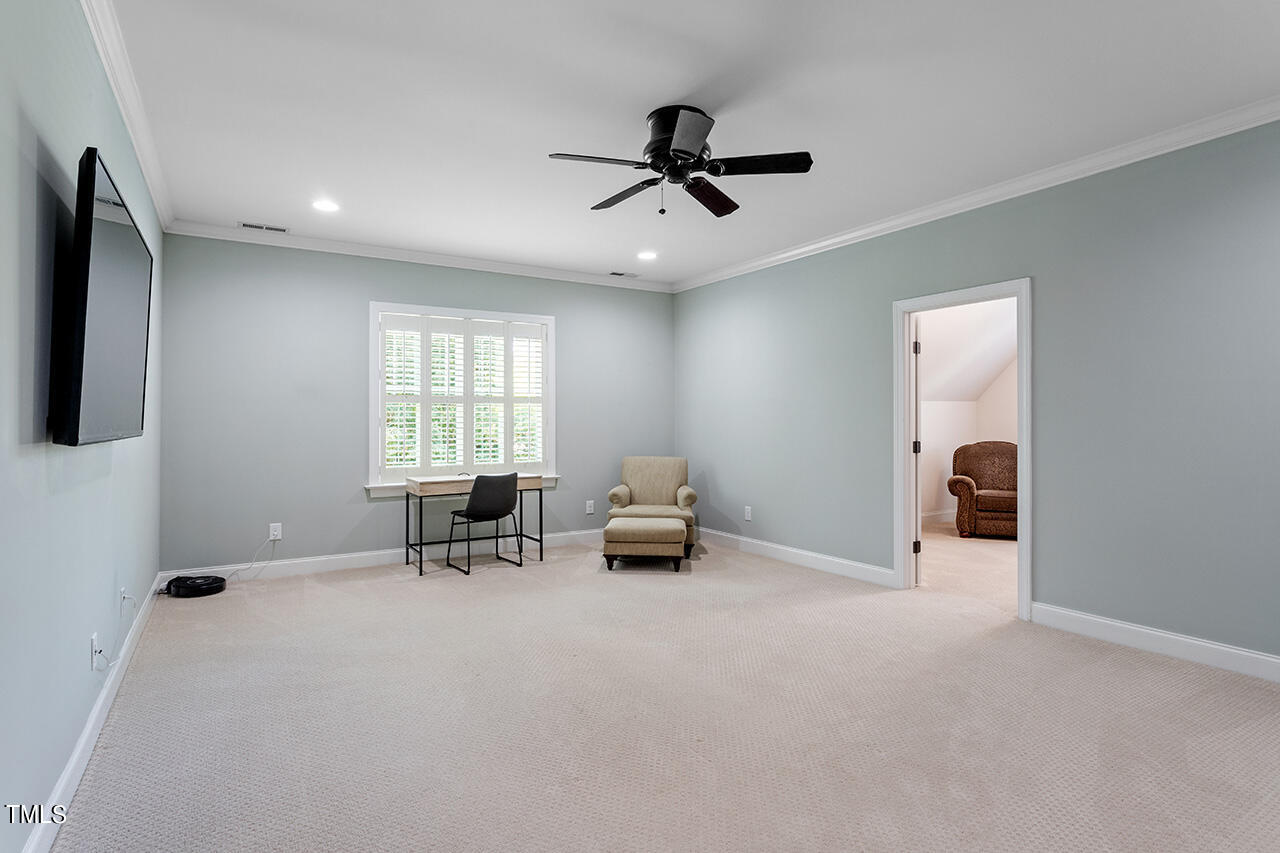 2016 Brassfield Road Raleigh, NC 27614 - Photo 32 of 44 a living room with furniture and window