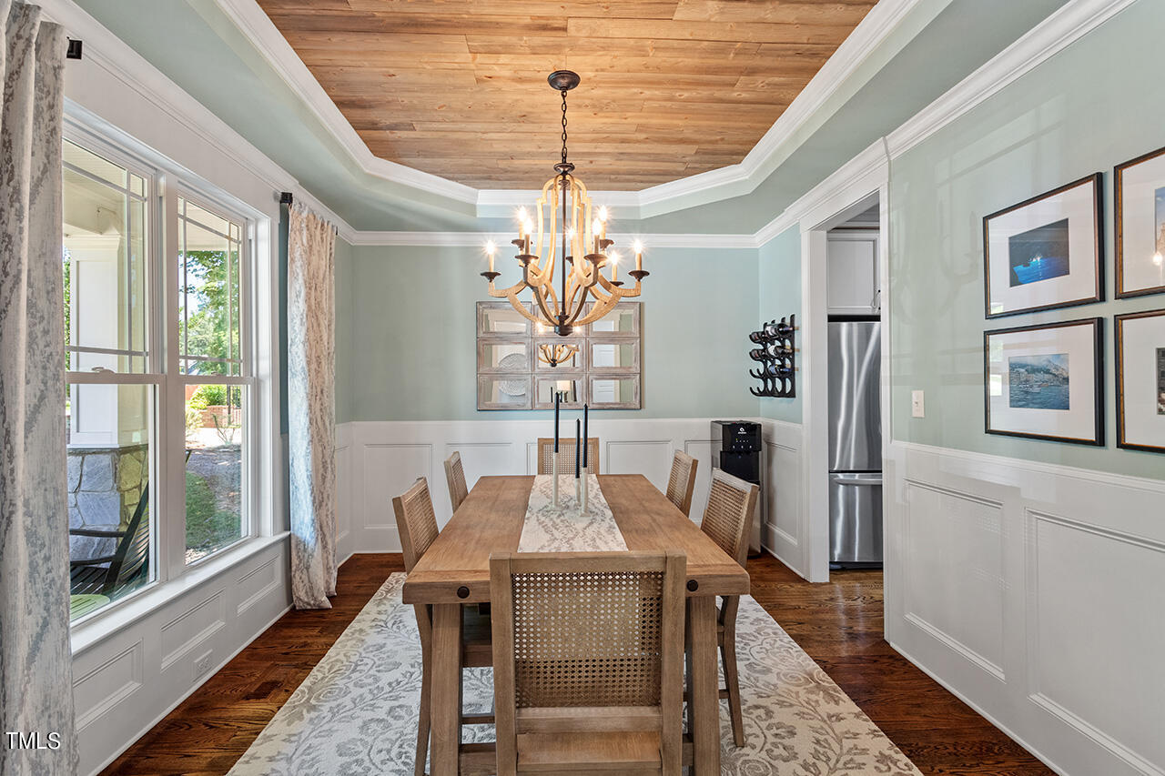 2016 Brassfield Road Raleigh, NC 27614 - Photo 5 of 44 a view of a dining room with furniture window and wooden floor