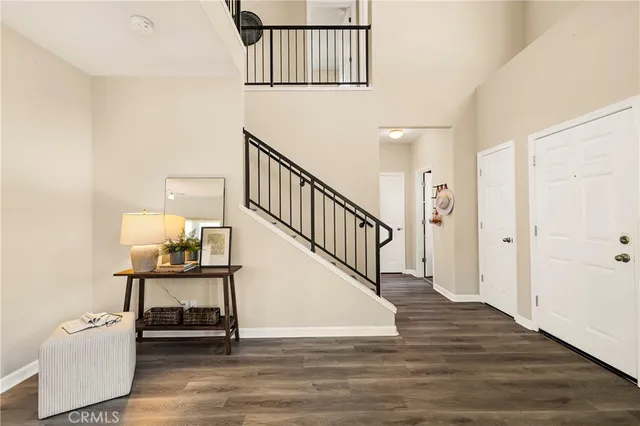 a view of a hallway with seating area