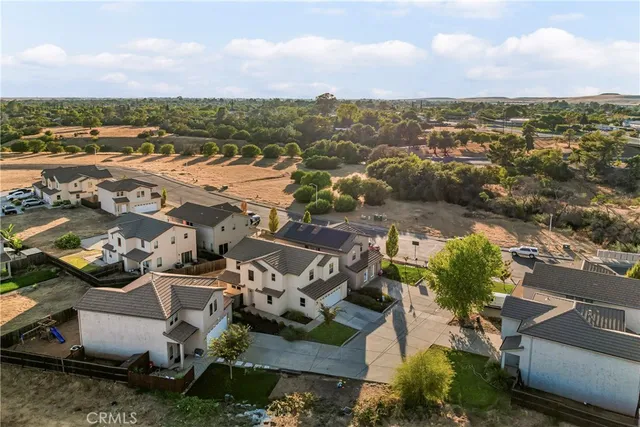 an aerial view of a house with a outdoor space