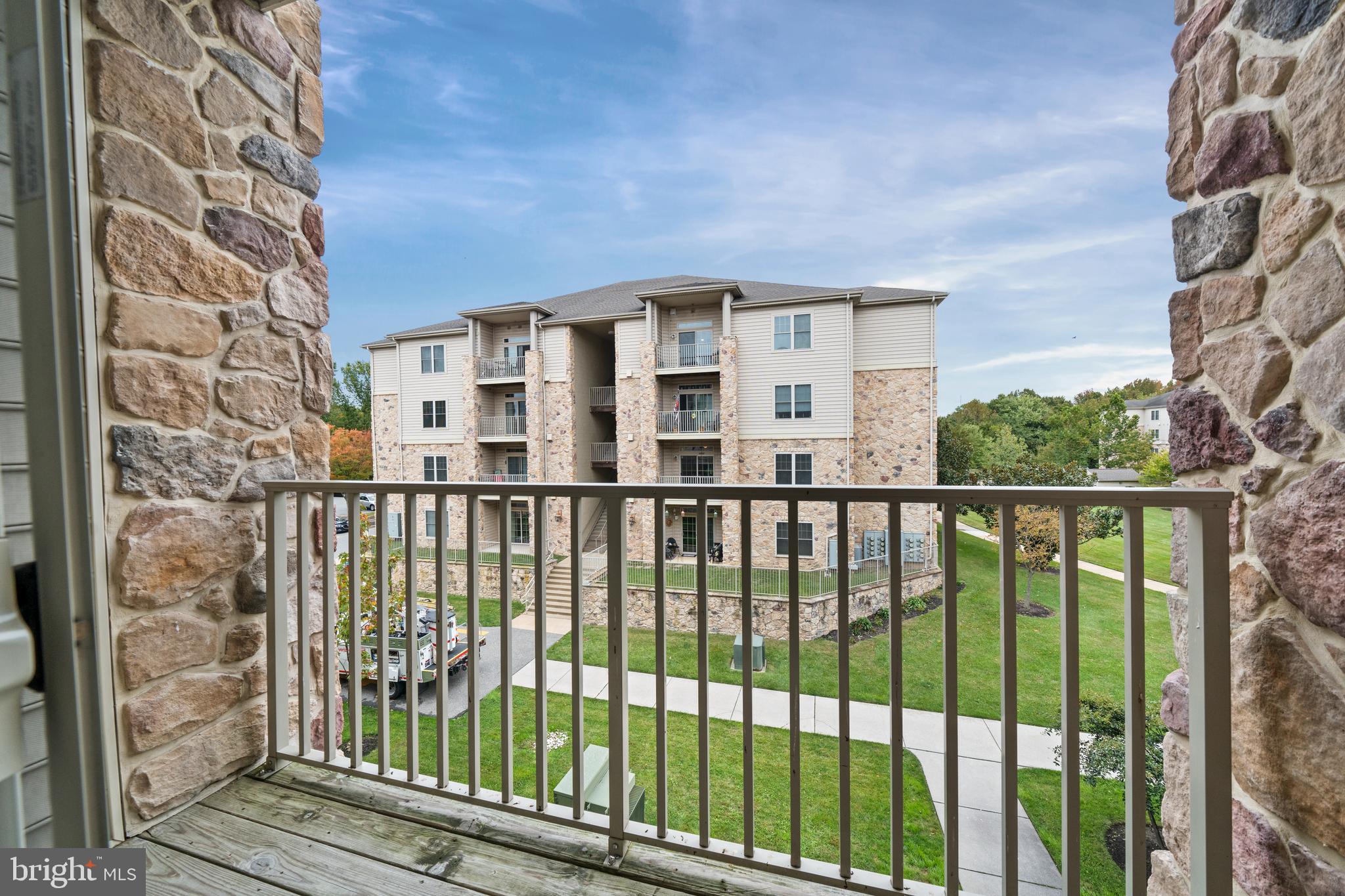 2000 Fountainview Circle, Unit 2312 Newark, DE 19713 - Photo 10 of 15 a view of a large building from a balcony