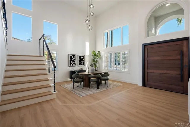 a view of hallway with wooden floor