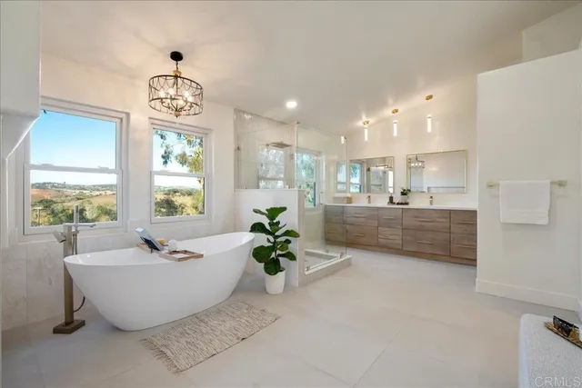 a bedroom with a large bed and a couch