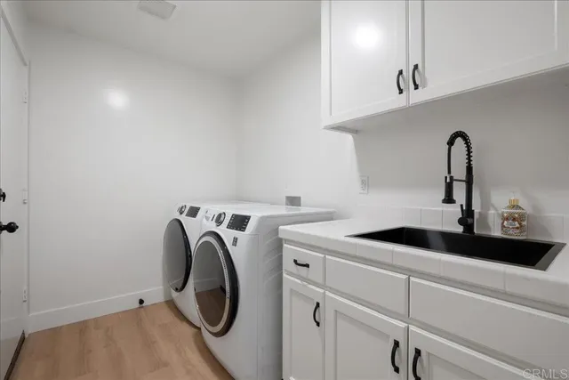 a front view of a house with swimming pool having outdoor seating