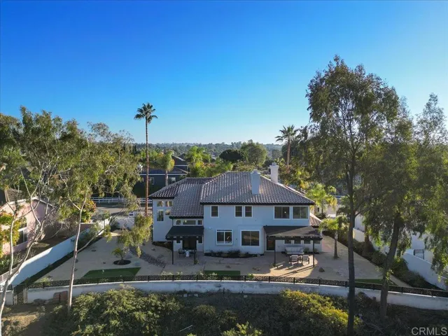 a view of a house with a yard and garage